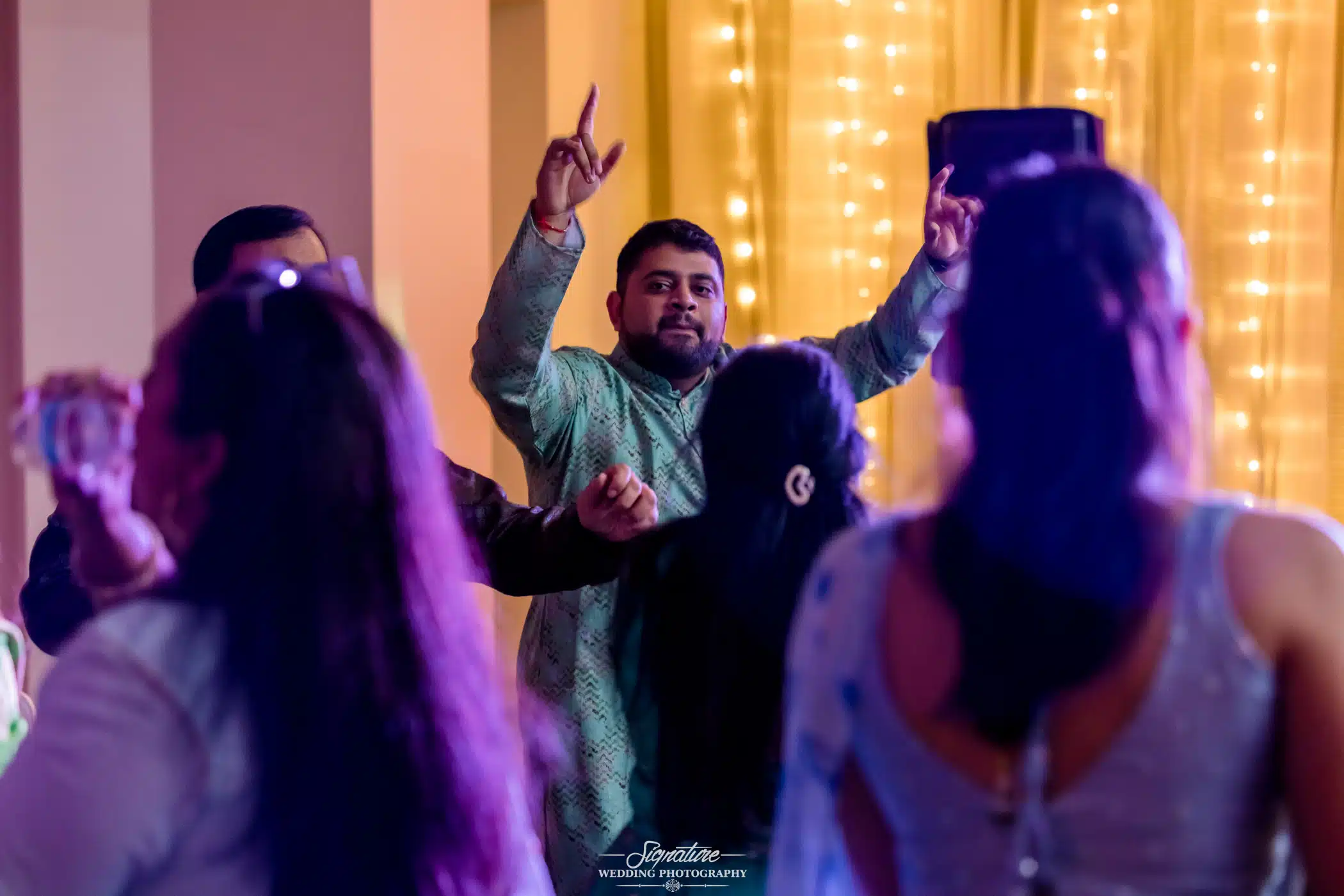 Image by Signature Wedding Photography Wedding guests dancing