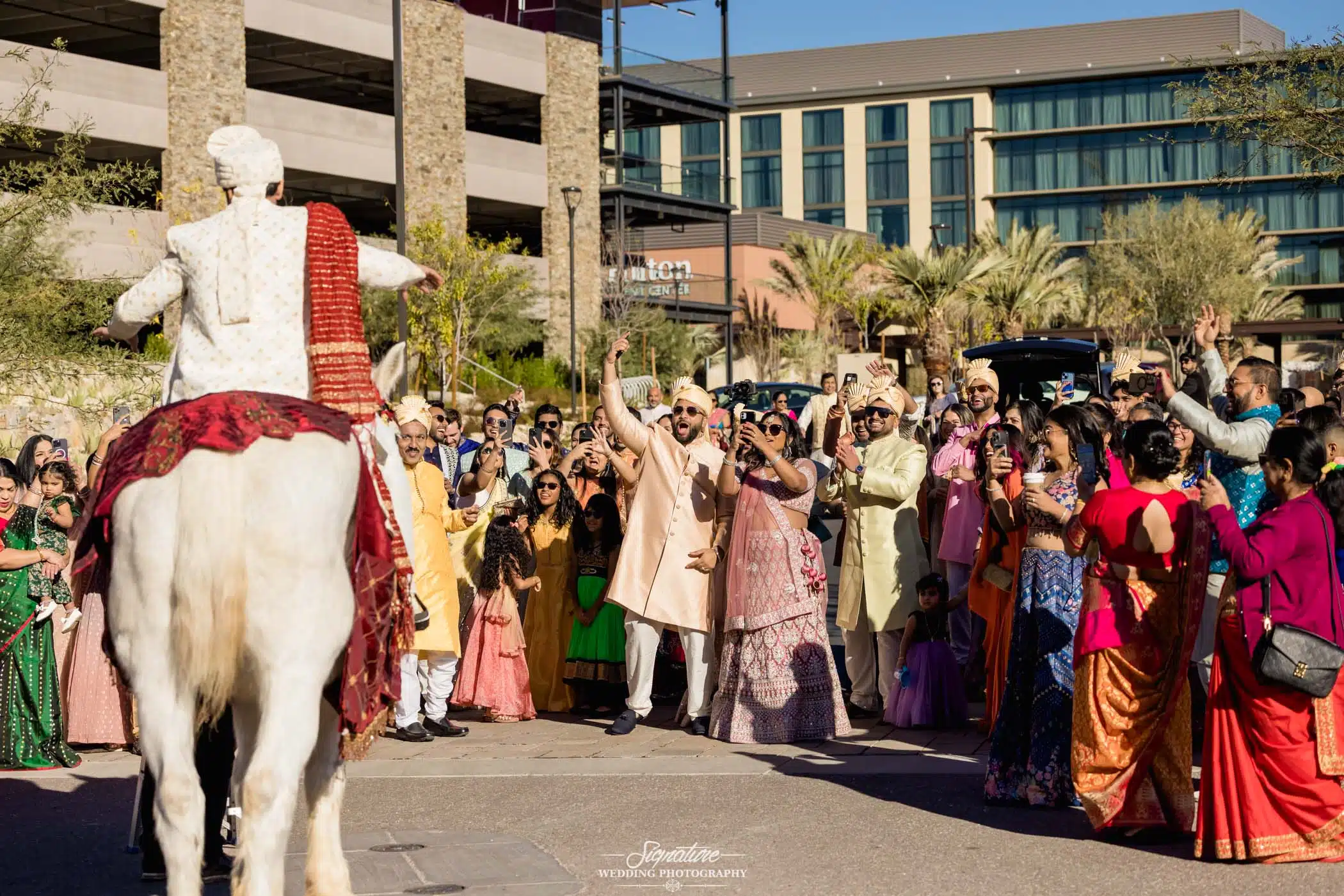 Image by Signature Wedding Photography Groom dancing with wedding guests