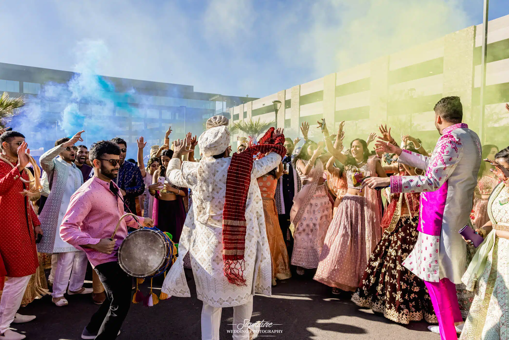 Image by Signature Wedding Photography Groom dancing with wedding guests