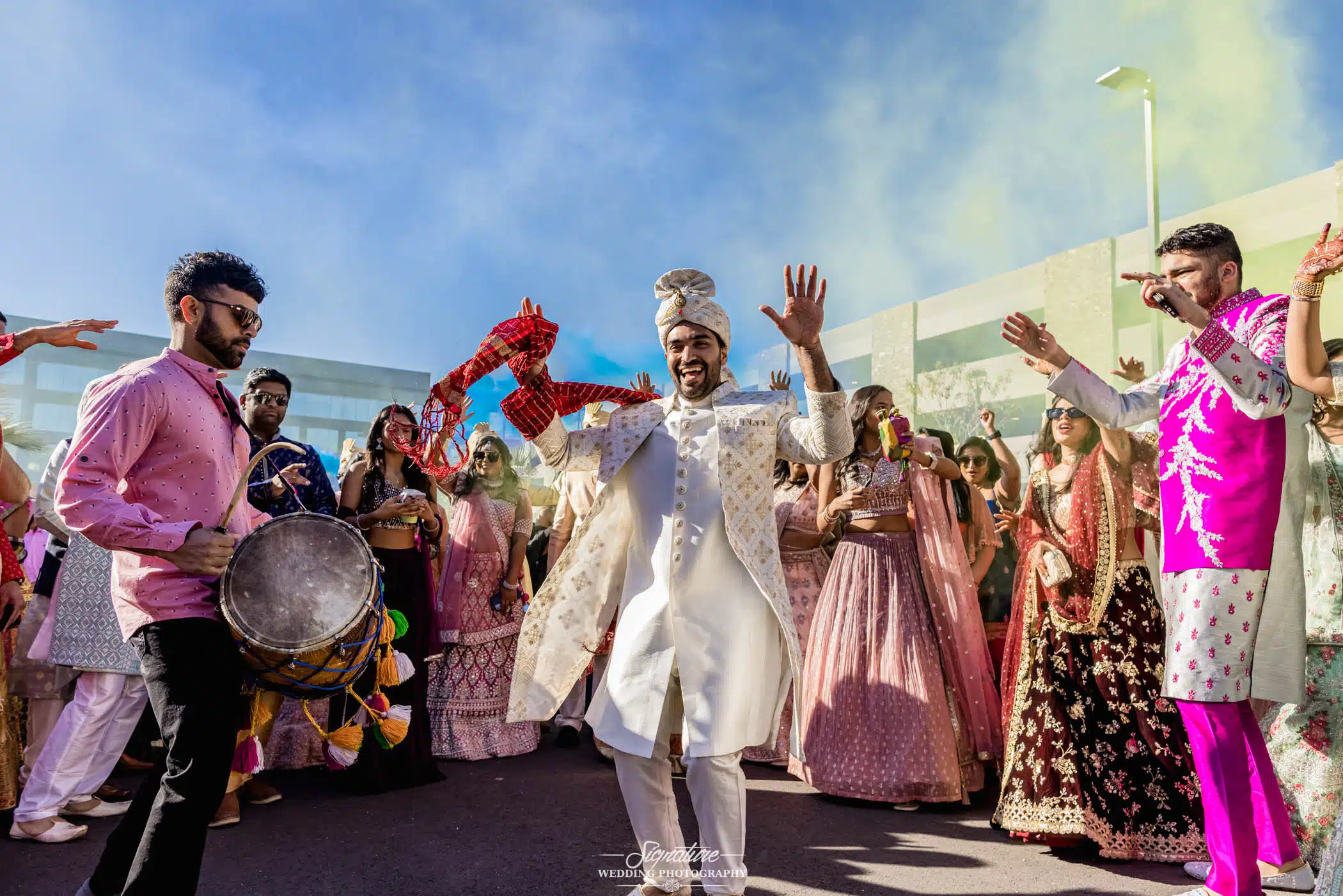 Image by Signature Wedding Photography Groom dancing with wedding guests