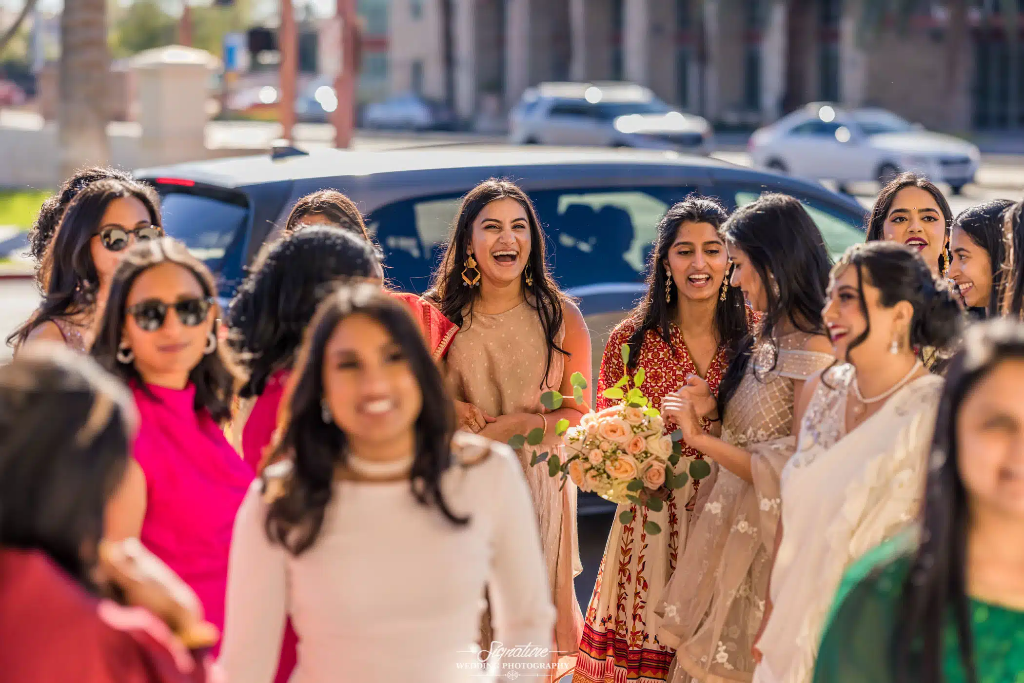 Image by Signature Wedding Photography Bride with her bridesmaids