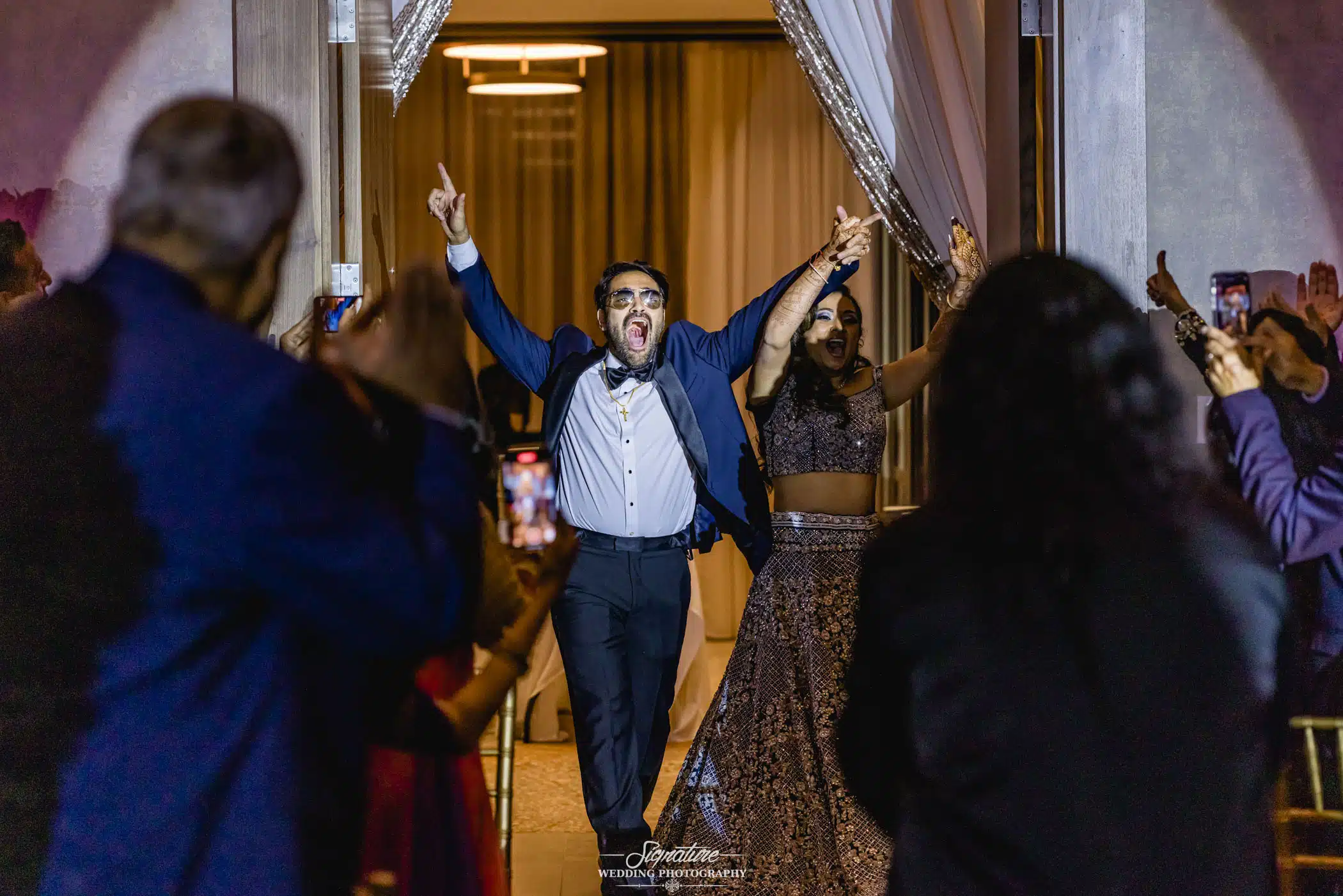 Image by Signature Wedding Photography Bride and groom grand entrance