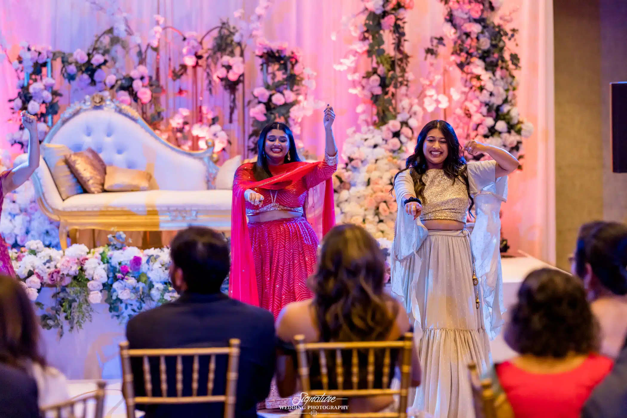 Image by Signature Wedding Photography Wedding guests dancing for bride and groom