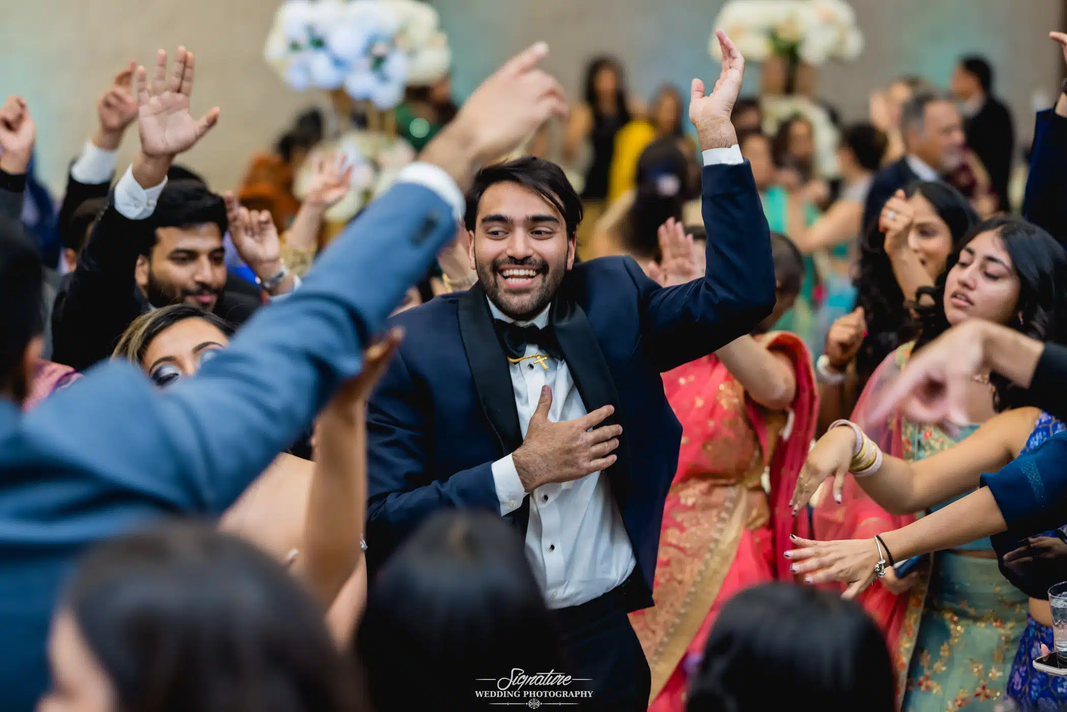 Image by Signature Wedding Photography Groom dancing