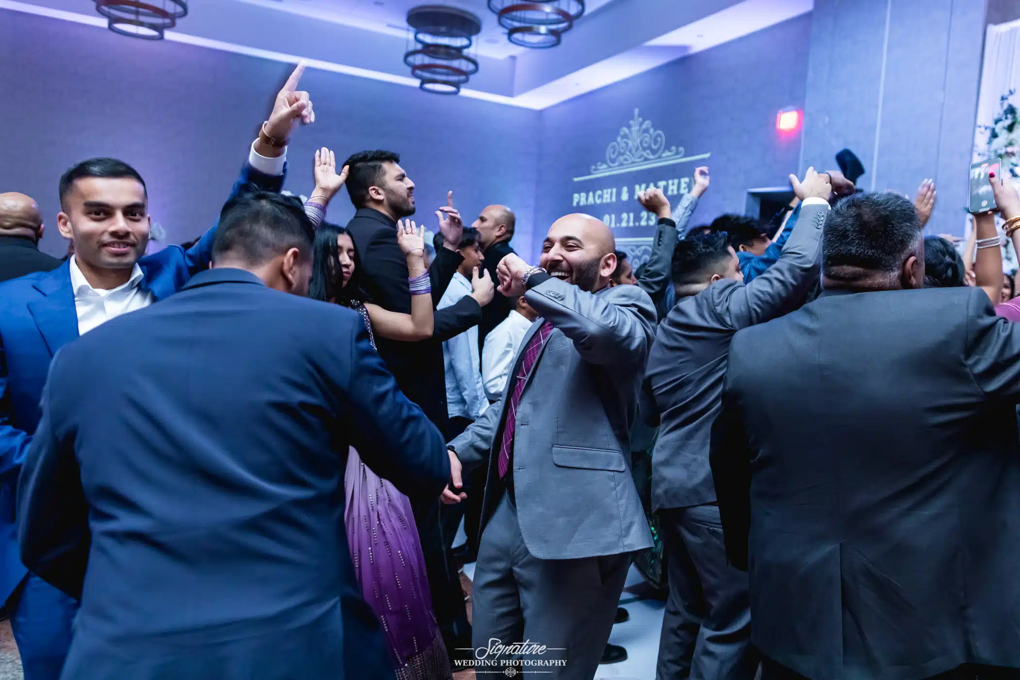 Image by Signature Wedding Photography Wedding guests dancing