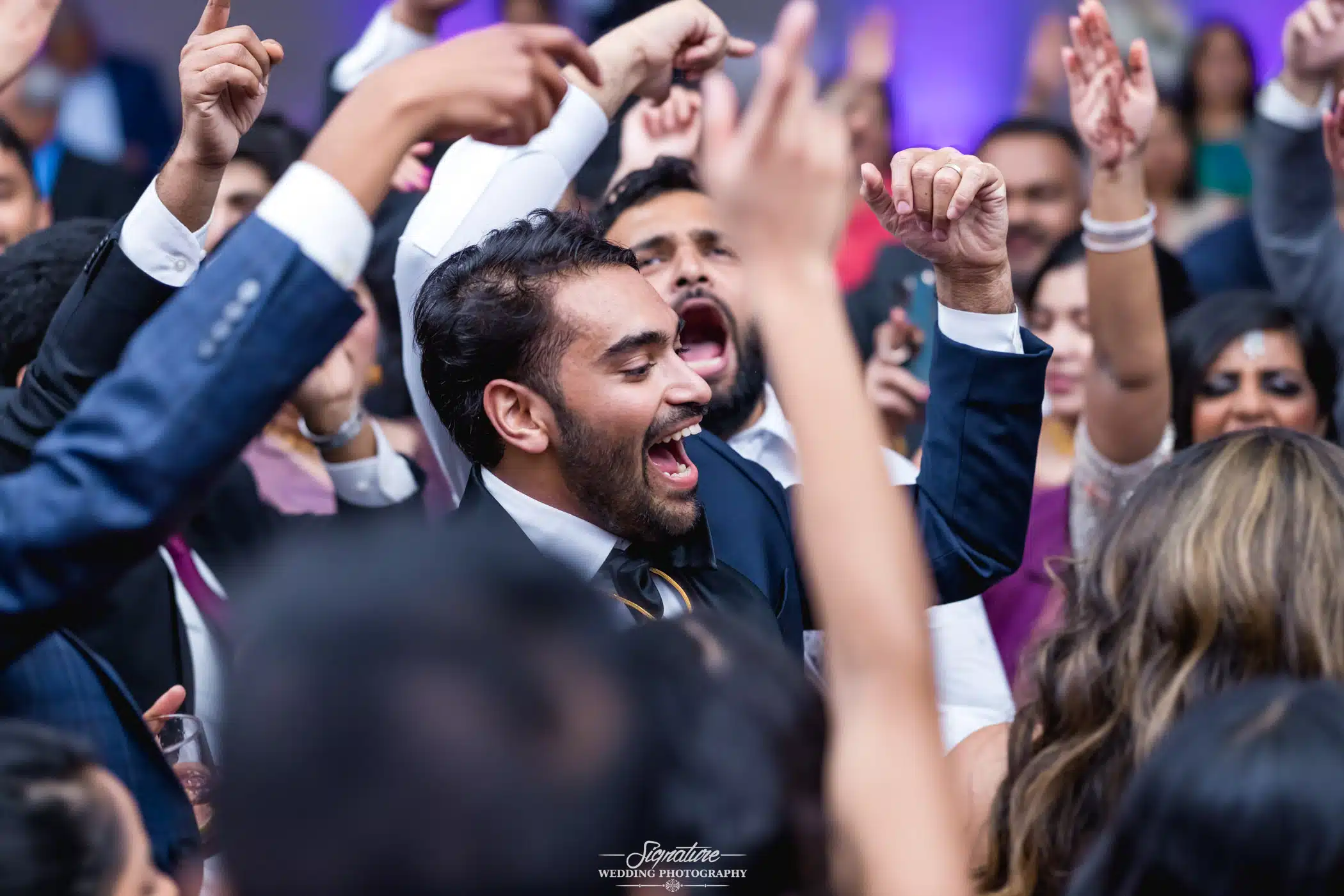 Image by Signature Wedding Photography Wedding guests dancing
