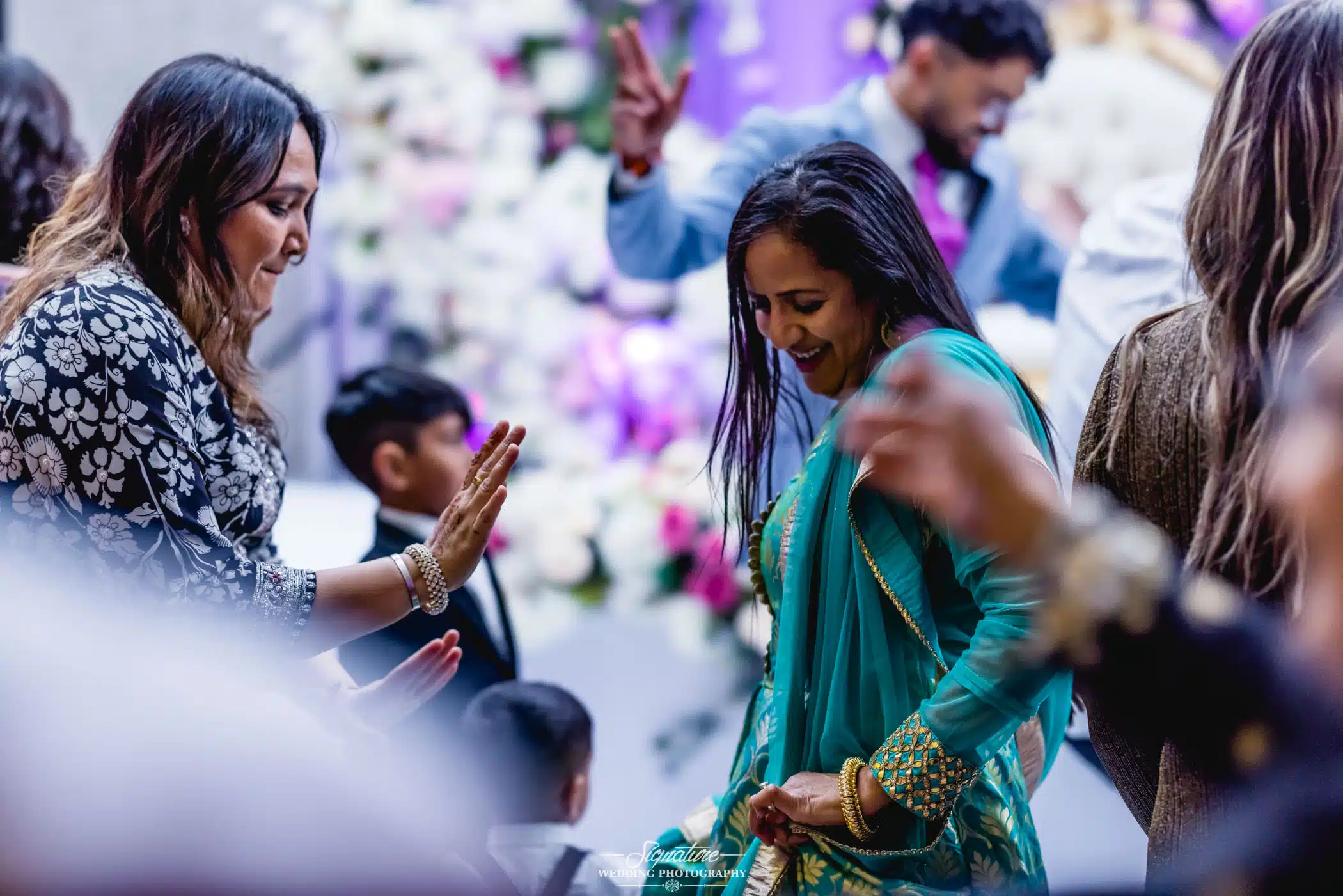 Image by Signature Wedding Photography Wedding guests dancing