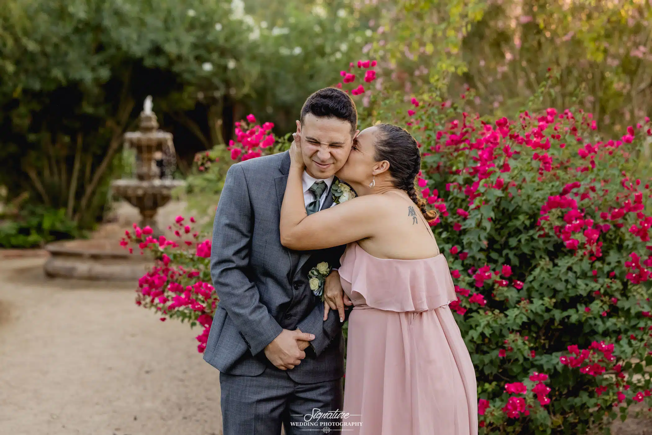 Image by Signature Wedding Photography groom with mom