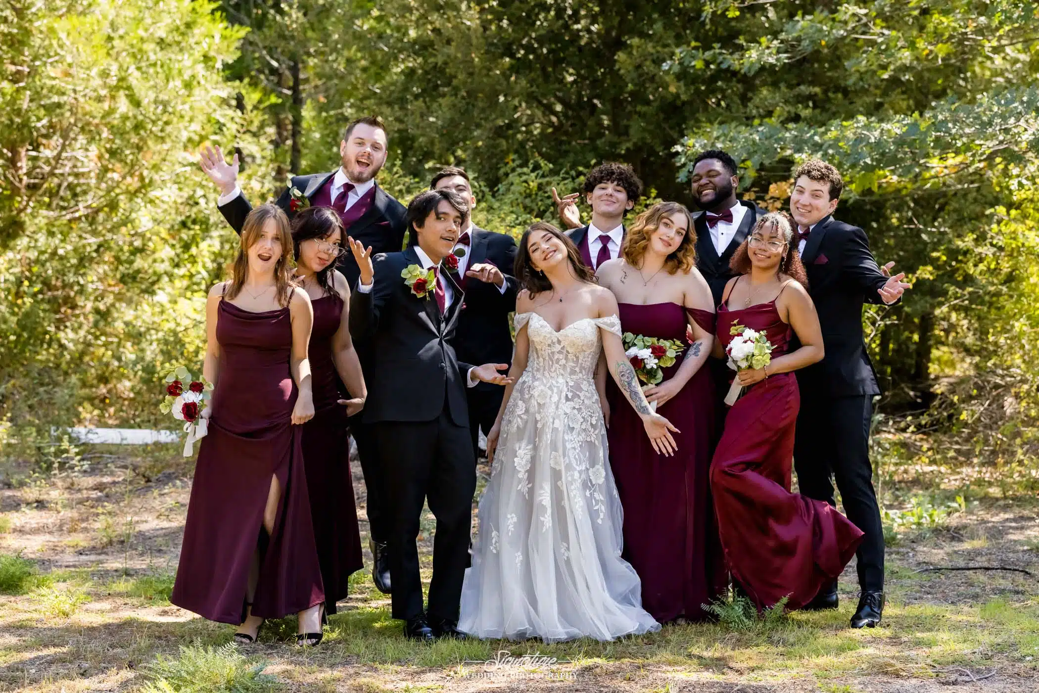 Image by Signature Wedding Photography candid group shot of various wedding party members
